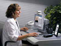 2000 photo of a female doctor at a computer
